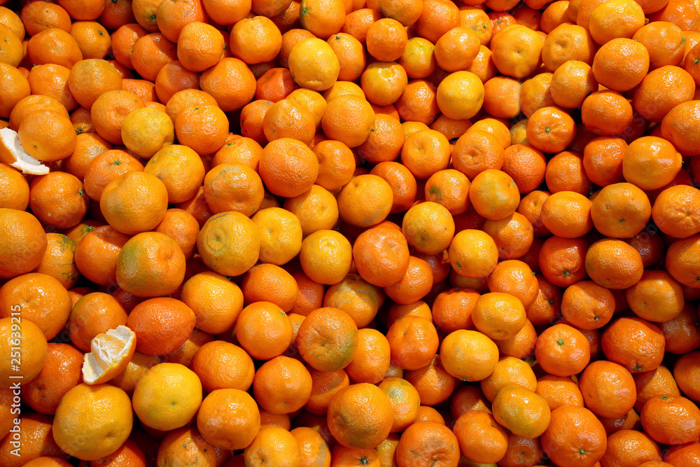 orange background of fresh tangerines
