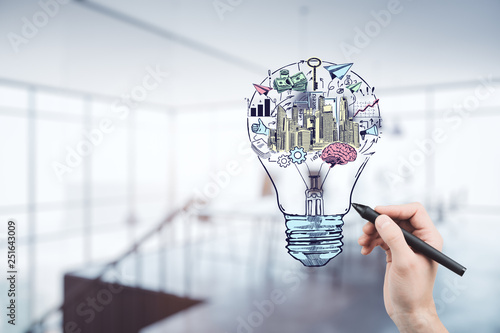 Hand drawing business idea concept on office background. photo