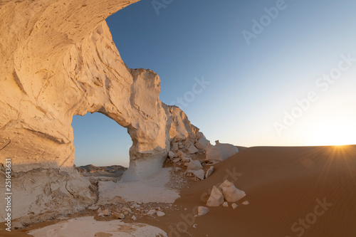 Sunset landscape with chalck rock formations at the White desert national park in Egypt