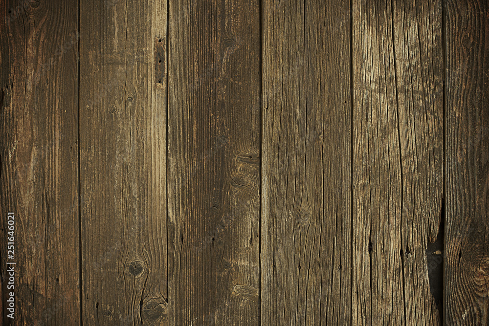 Naklejka premium Old weathered wooden wall background