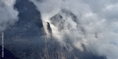 Panoramic view of the cloudy mountains landscape in Lauterbrunnen valley in Switzerland.
