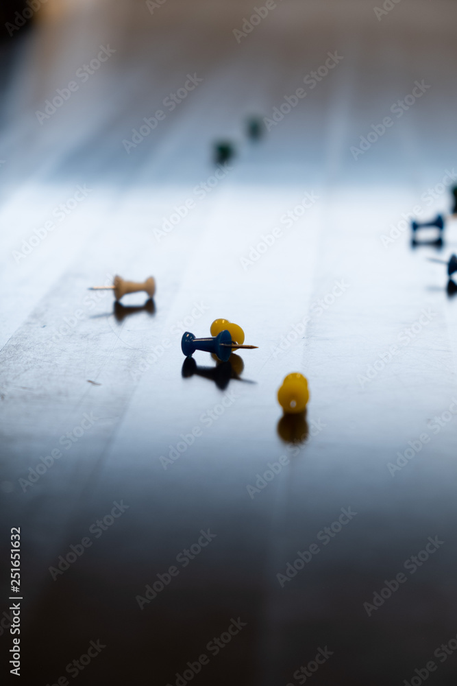 Colorful needles pins on a black table! Colorful needles pins on a black table!