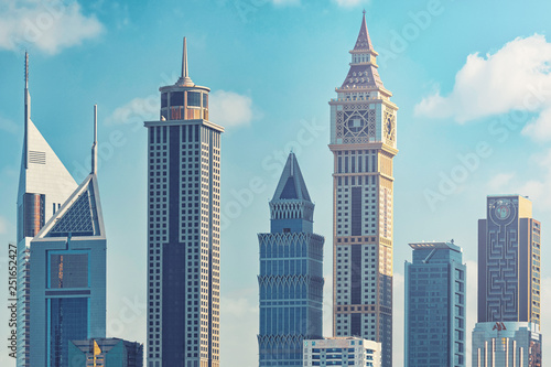 Al Yaqoub Tower inspired by Elizabeth Tower  Big Ben  in London  surrounded by other high buildings along Sheikh Zayed Road