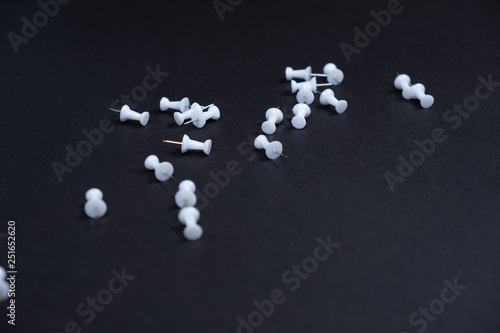 Photos of white pins needles in black background!