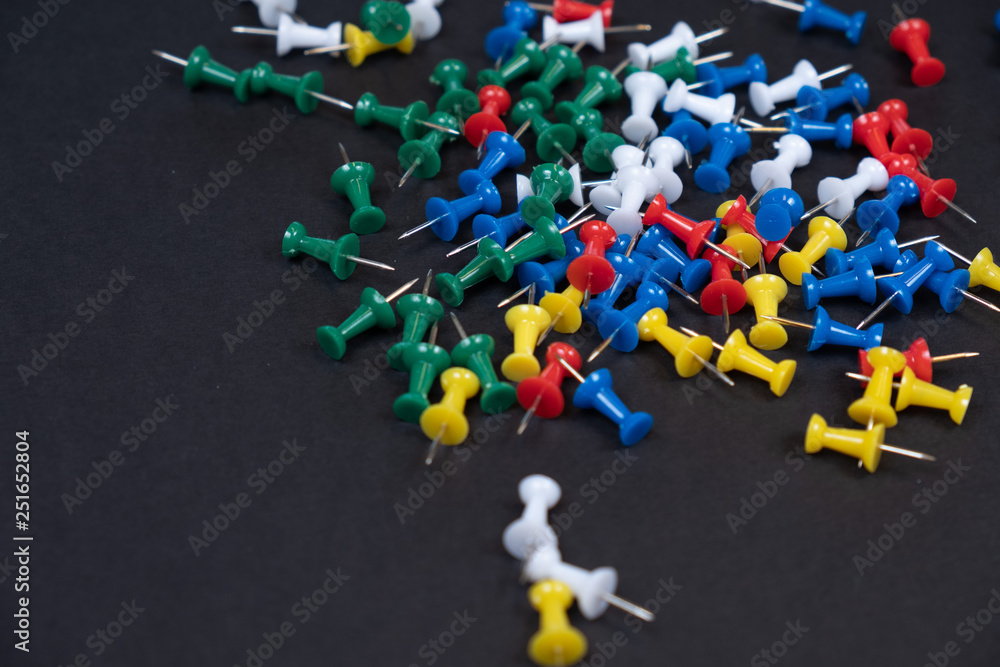 Colorful needles pins in a black background! Colorful needles pins in a black background!