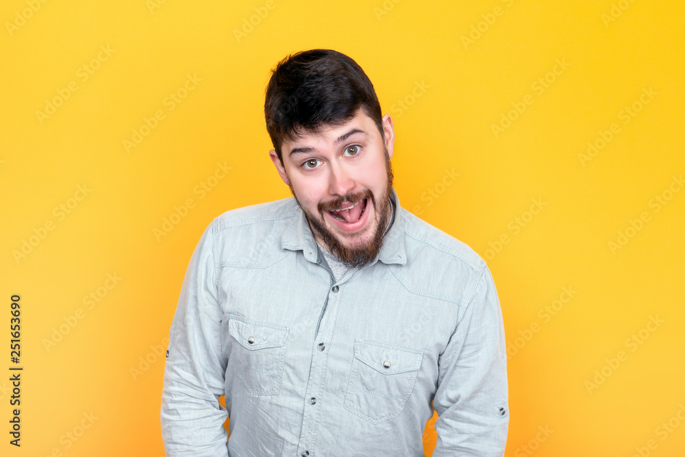 funny comic man smiling on a yellow background funny comic man smiling on a yellow background