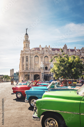 Cuban colorful vintage cars in front of the Gran Teatro - Havana, Cuba © diegograndi