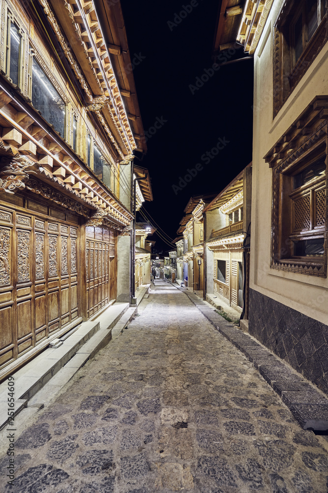 Empty street of Shangri La Old Town at night, China.