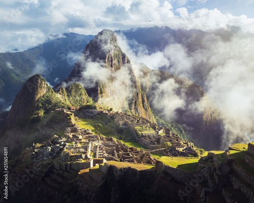 Machu Picchu Inca ruins with fog - Sacred Valley, Peru