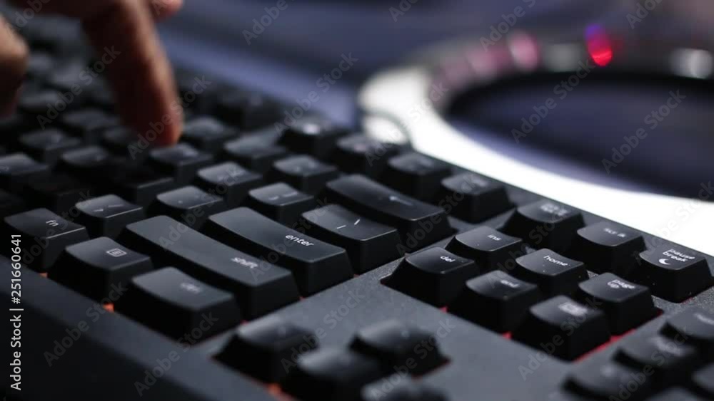 Pressing keys on computer gaming keyboard with RGB backlights Pressing keys on computer gaming keyboard with RGB backlights