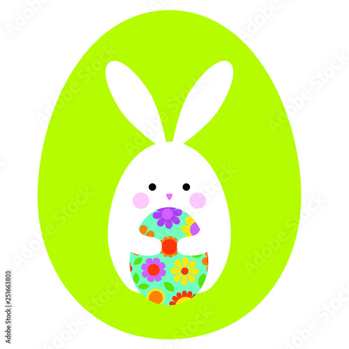 cute Easter bunny holding egg on green eg