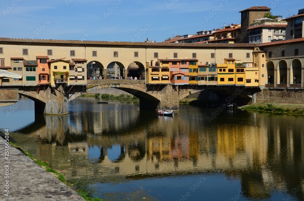 The Ponte Vecchio in Florence over Arno river. Italy.