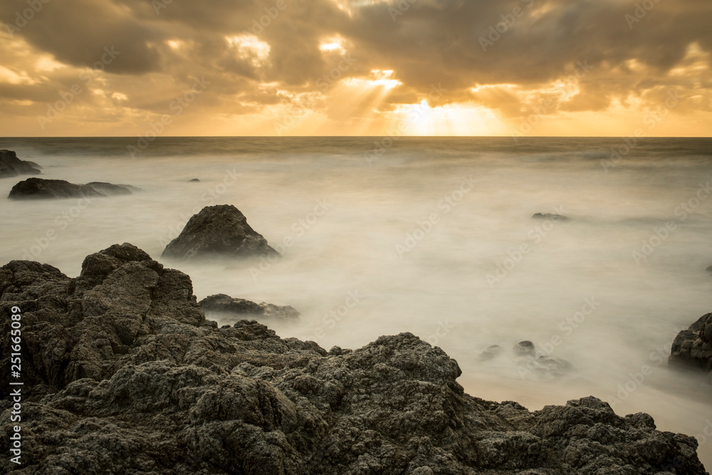 Beautiful scenic of the rocky California coast at sunset, extremely long exposure Beautiful scenic of the rocky California coast at sunset, extremely long exposure