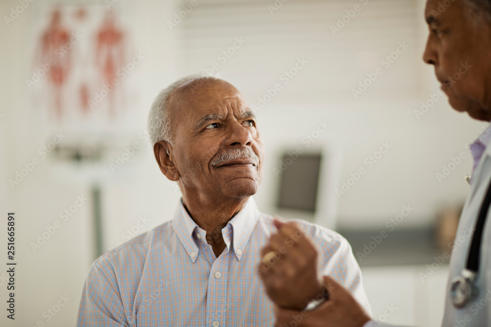 Doctor examining patient in hospital Doctor examining patient in hospital