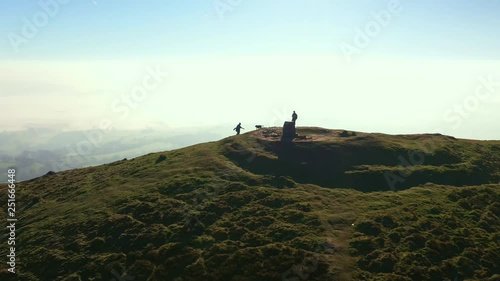 arerial shot of Mountain peek with a haze and low cloud- skirrid fawr south wales photo