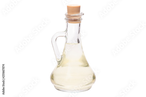 transparent pitcher with stopper AI yellow liquid. the bottle of oil. isolated on white background.