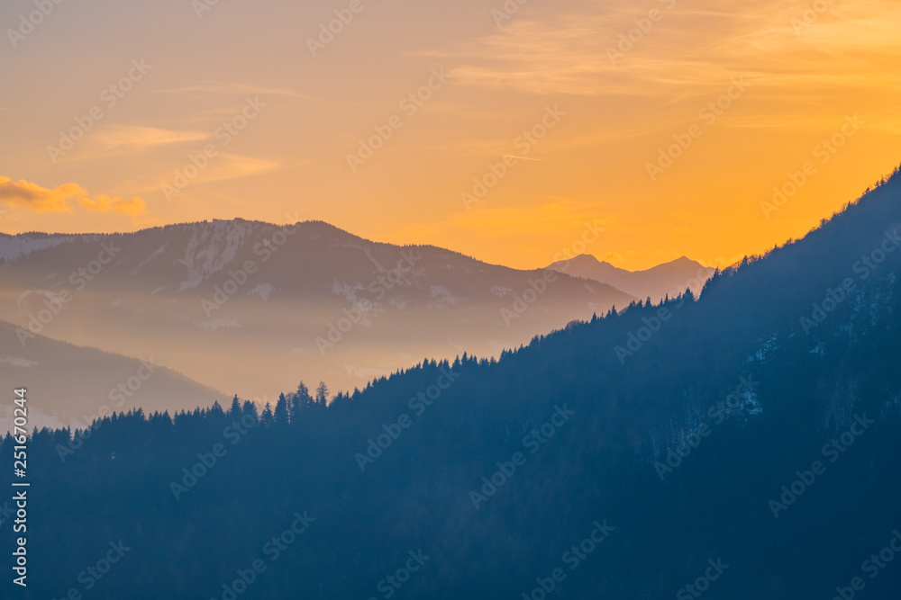 View over valley Ennstal to sunset over mountains Gumpeneck, Hangofen