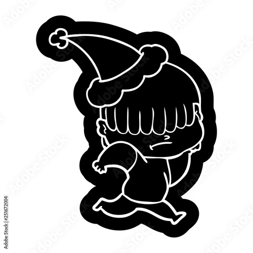 cartoon icon of a boy with untidy hair wearing santa hat