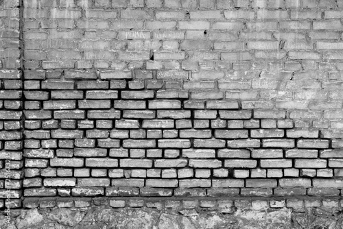 Texture  brick  wall  it can be used as a background . Brick texture with scratches and cracks