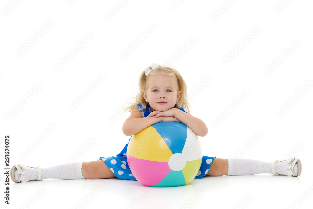 Little girl is playing with a ball Little girl is playing with a ball