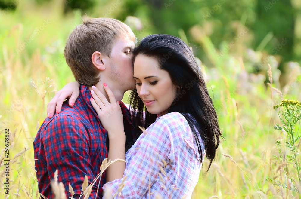 Fototapeta premium Enamoured young pair on the nature