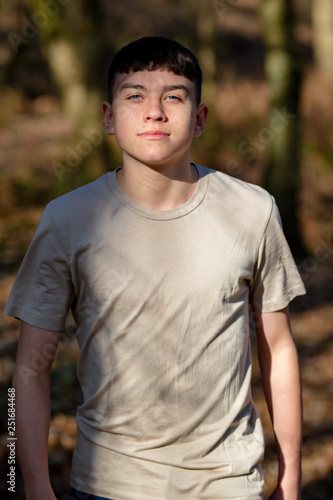 Teenage boy outside on a bright Spring day