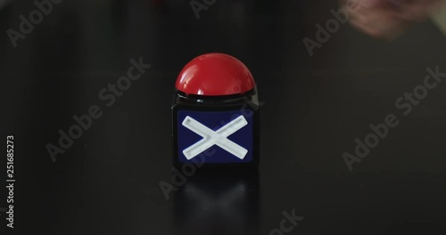 Closeup of female palm presses stop button.