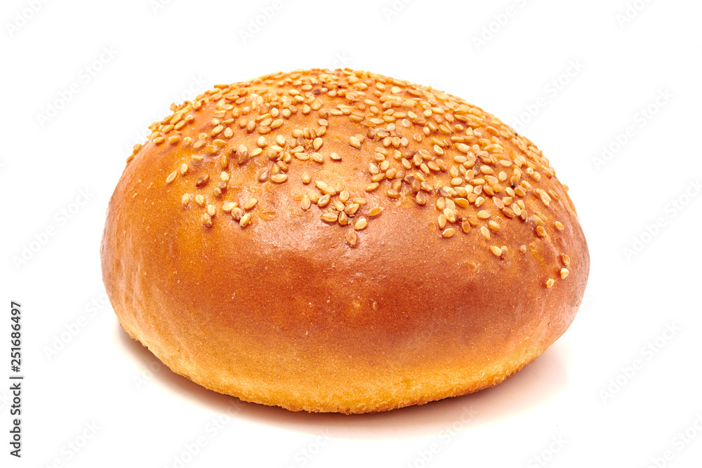 Hamburger bun with sesame seeds isolated on white background
