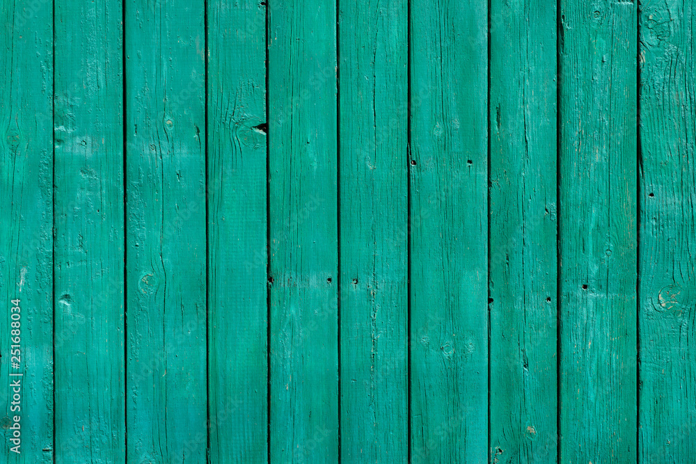 Wooden fence covered with green paint. For design, banner and layout Wooden fence covered with green paint. For design, banner and layout