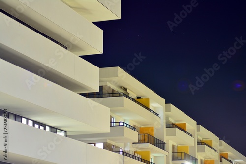 Exterior of apartment building at night 