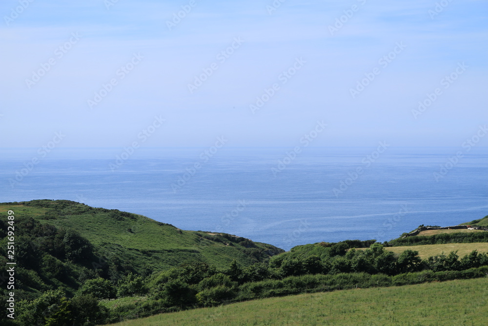 A sea view of the Atlantic ocean over the coast of Cornwall.