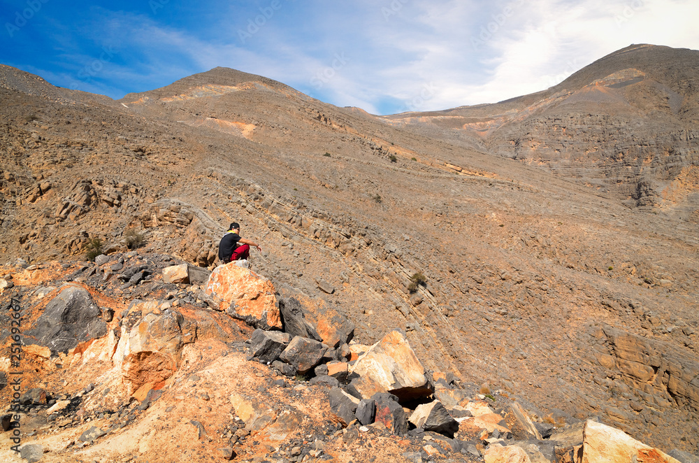 A hiker in Jebel Jais mountain in Ras Al Khaimah