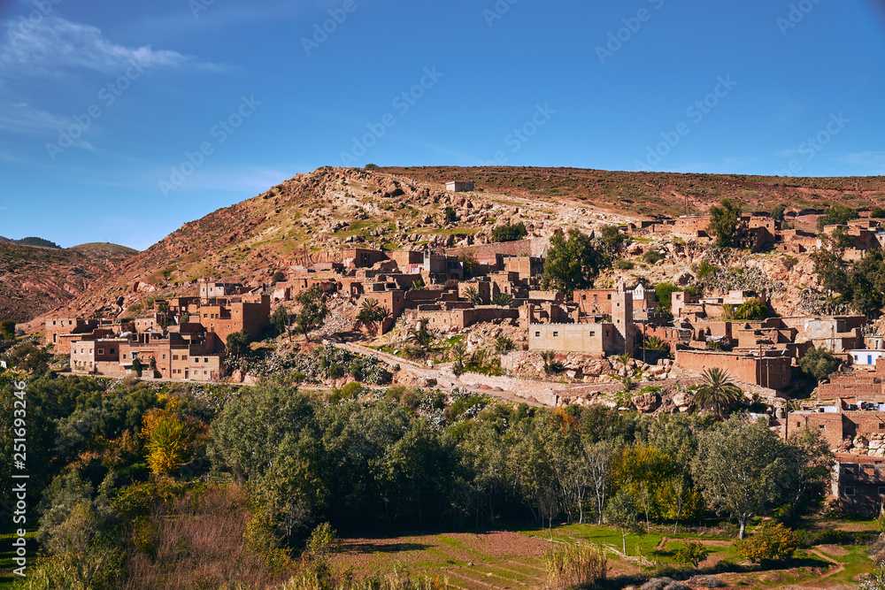 View of typical morrocan city on the hill during sunny day