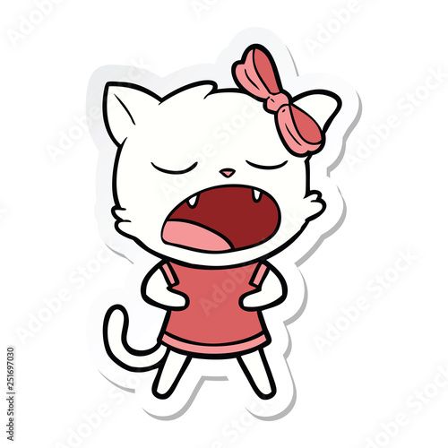 sticker of a cartoon yawning cat