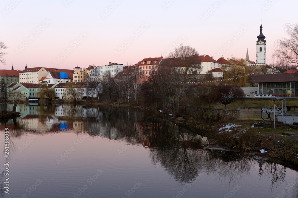 Evening winter royal medieval Town Pisek with the Castle above the river Otava, Czech Republic 