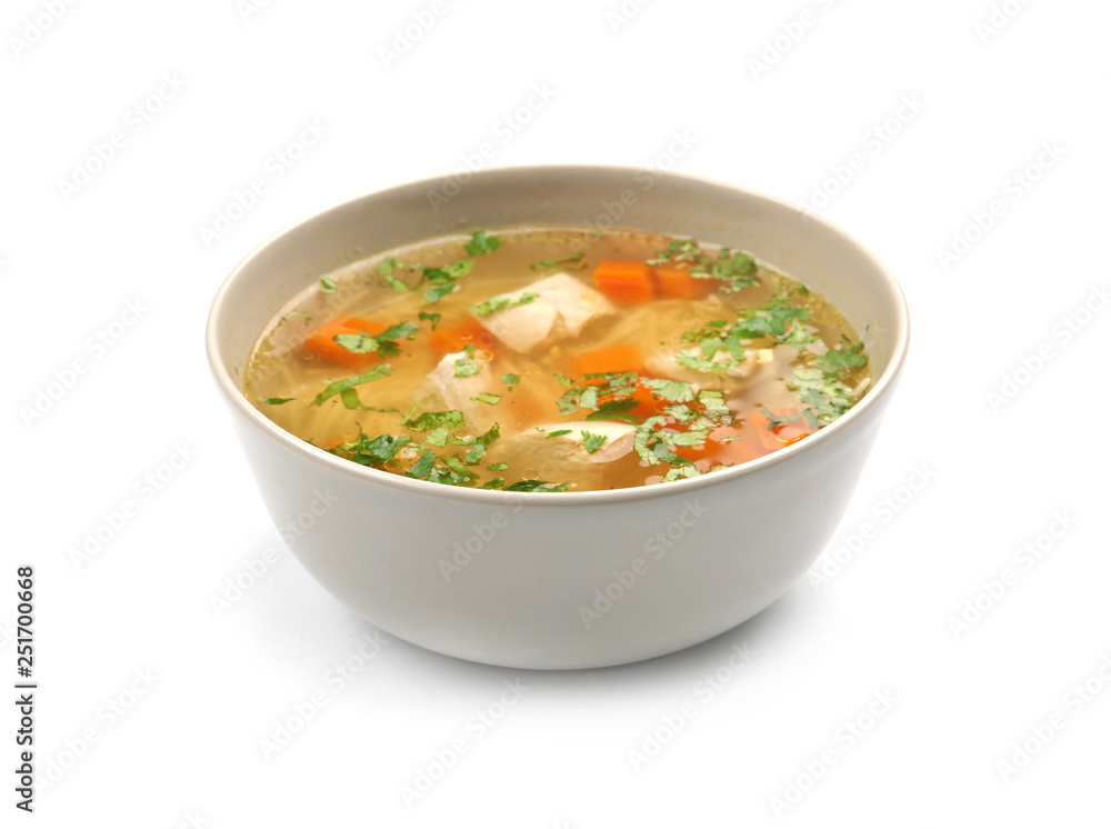 Bowl with fresh homemade chicken soup on white background