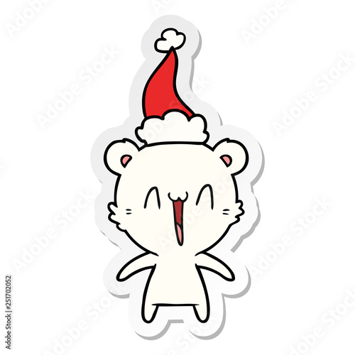 happy polar bear sticker cartoon of a wearing santa hat