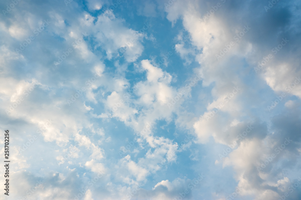 Fototapeta premium Blue sky and beautiful fluffy clouds in a sunny day.
