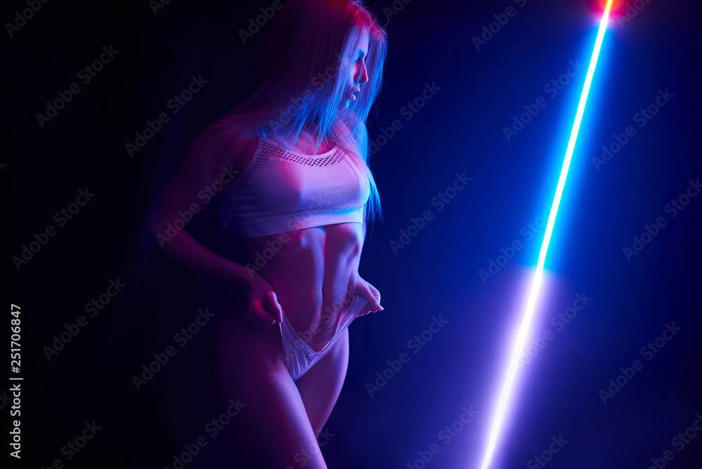 Pole dance girl with perfect body in black sexy lingerie. Night club  concept Stock Photo | Adobe Stock