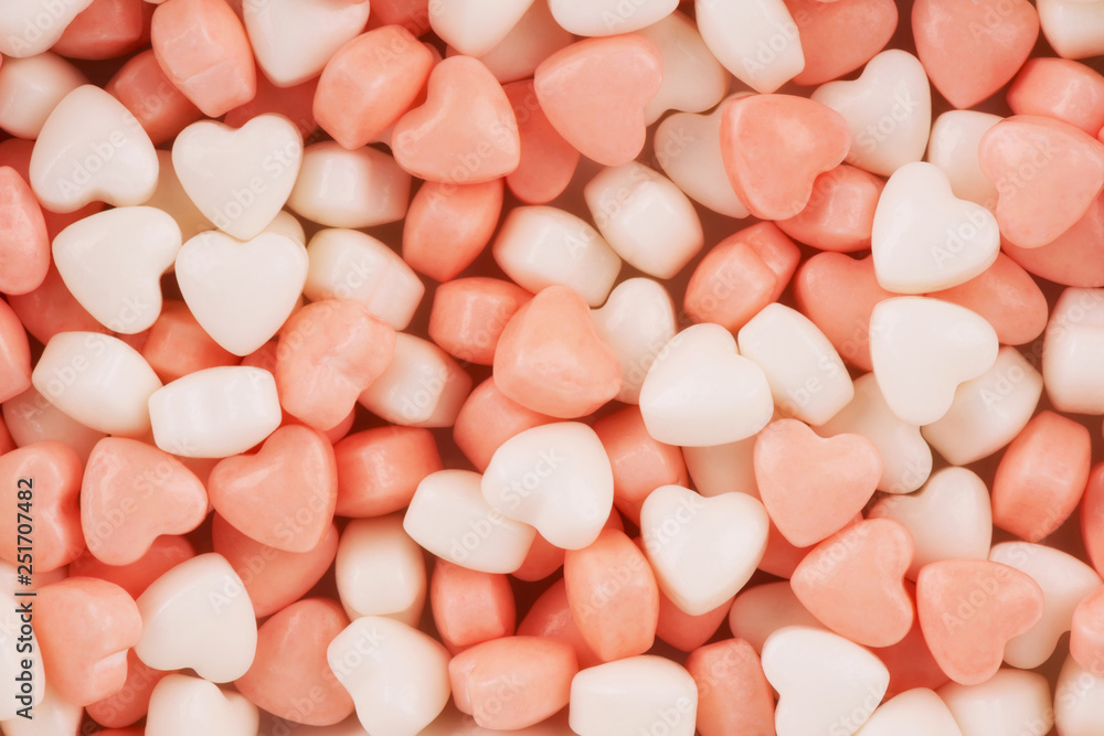 Extremely close up on small heart shaped candies. Valentines day greeting card concept. Extremely close up on small heart shaped candies. Valentines day greeting card concept.