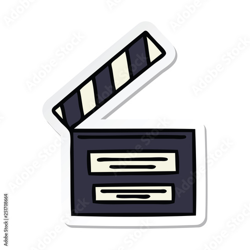 sticker of a cute cartoon film clapper board