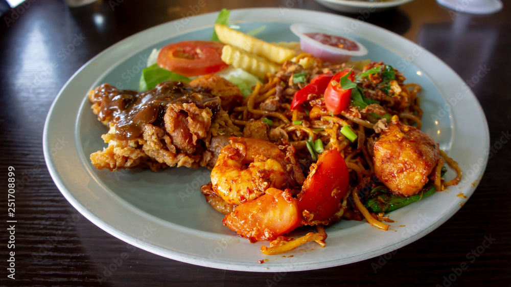 Malaysian style fried noodle known as mee goreng mamak Malaysian style fried noodle known as mee goreng mamak