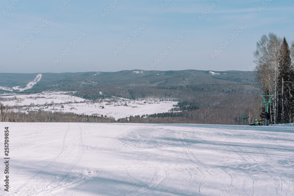 Snow Mountain look down. View from the mountain. Ski resort. Snow Mountain look down. View from the mountain. Ski resort.