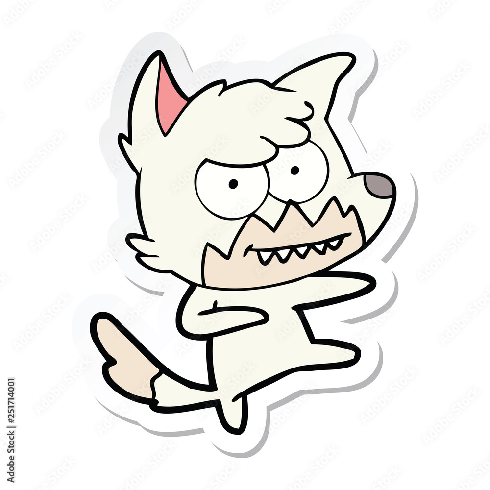 sticker of a cartoon grinning fox sticker of a cartoon grinning fox