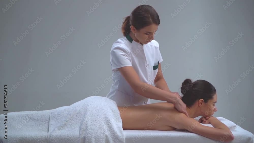Young woman in spa. Traditional healing therapy and massaging treatments. Health and skin care, massage and recreation concept. Young woman in spa. Traditional healing therapy and massaging treatments. Health and skin care, massage and recreation concept.