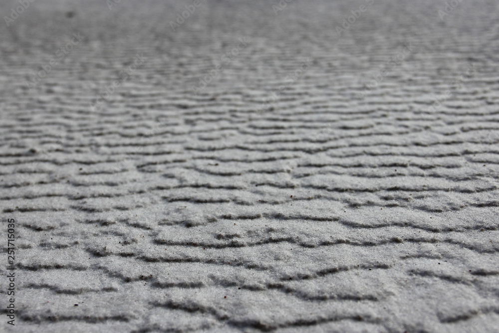 Snow dunes in blurred perspective - wavy texture for background Snow dunes in blurred perspective - wavy texture for background