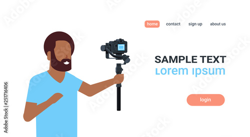 man blogger broadcasting live stream report shooting selfie video african guy recording himself using camera gimbal stabilizer blogging concept copy space horizontal