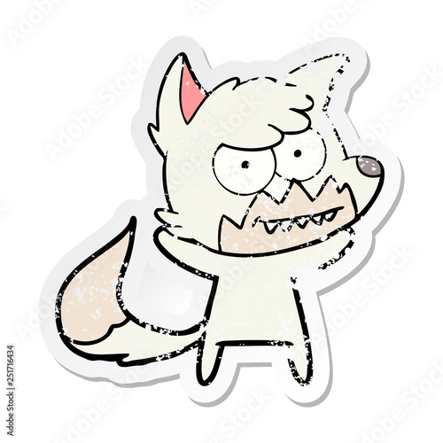 distressed sticker of a cartoon grinning fox