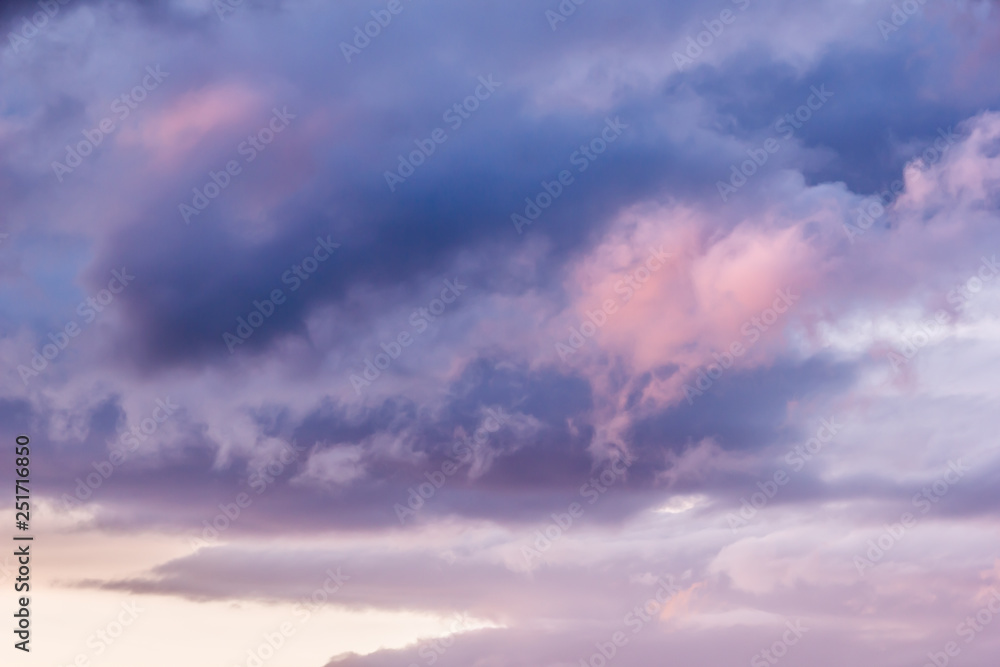 Sky with cumulus clouds at sunset or dawn. Clouds as background