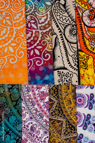 Assortment of colorful fabrics for sale in local market in Rajasthan, India. Close up